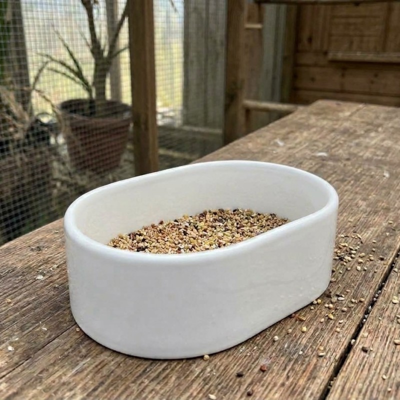 MANGEOIRE PLASTIC OVALE/BLANC - 11X8X4CM